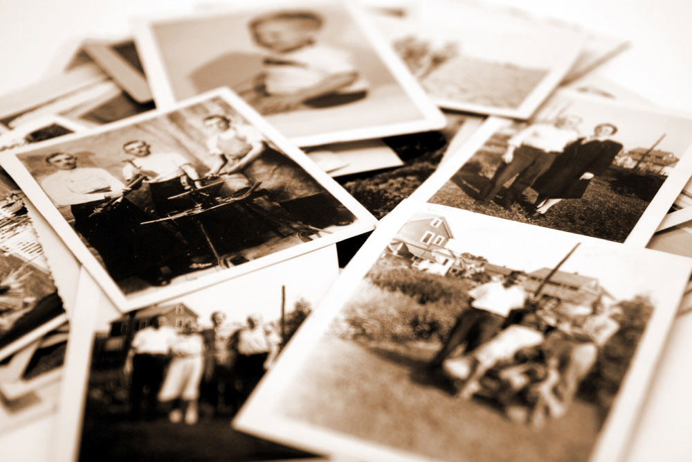 Link: Silence by Lauren Maloney. Image: A pile of sepia toned family photographs