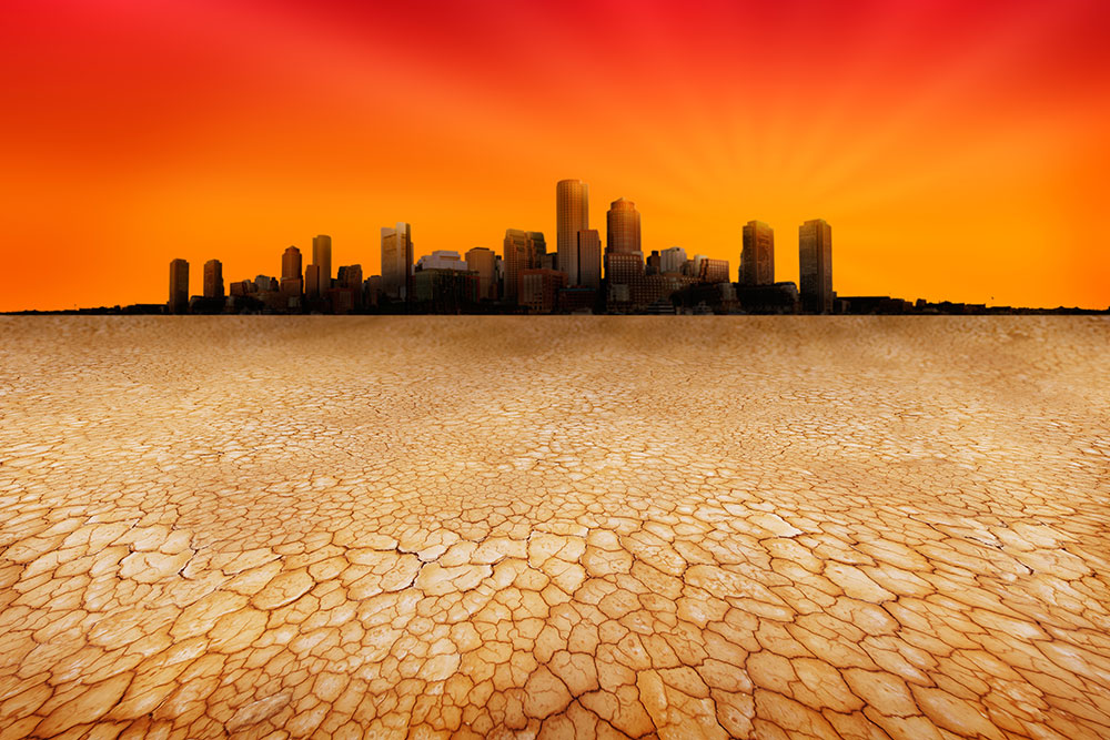 Image: .A futuristic city in the distance, seen from across a barren land.