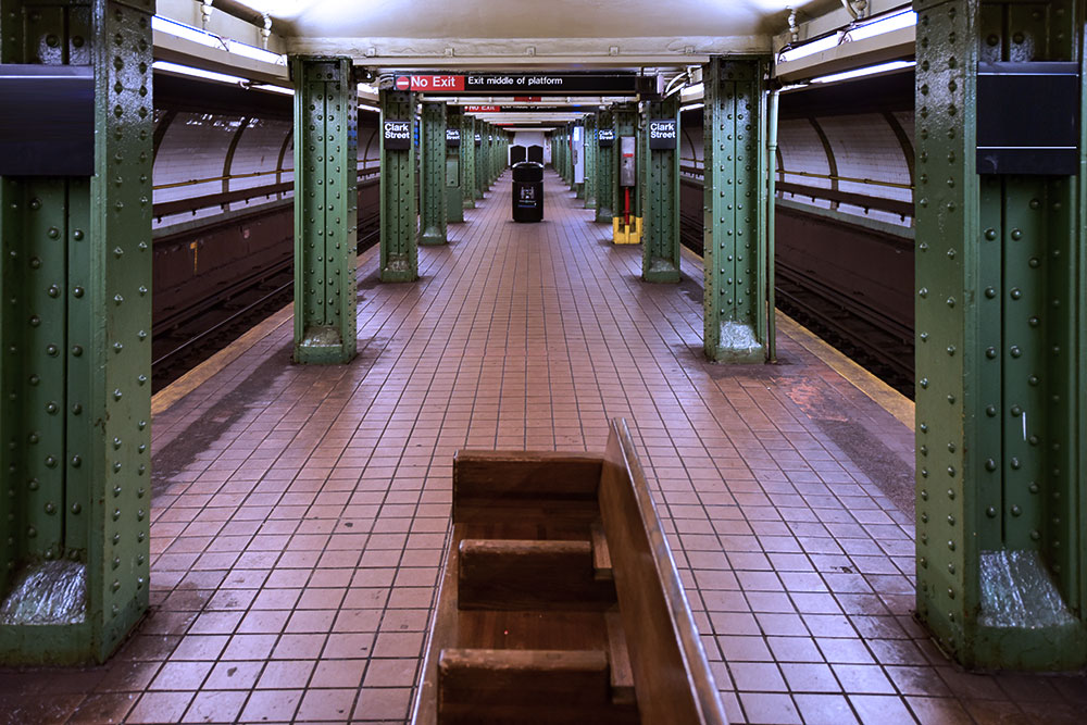 Image: An old, dirt subway station. 