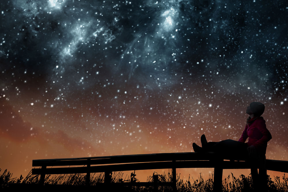 End. Beginning. Again. by Lea Oberst. Image: A girl looking at a starry sky. 